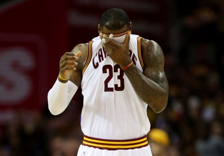 CLEVELAND, OH - JUNE 16: LeBron James #23 of the Cleveland Cavaliers reacts in the first quarter against the Golden State Warriors during Game Six of the 2015 NBA Finals at Quicken Loans Arena on June 16, 2015 in Cleveland, Ohio. NOTE TO USER: User expressly acknowledges and agrees that, by downloading and or using this photograph, user is consenting to the terms and conditions of Getty Images License Agreement. (Photo by Ezra Shaw/Getty Images) ORG XMIT: 556889511 ORIG FILE ID: 477366984