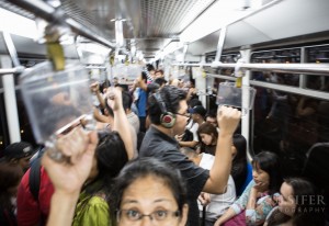 Queson City, Philippines - A lightly loaded rail car is about to get so crammed I can't even lift the camera over my head in metro Manila's MRT transit system.