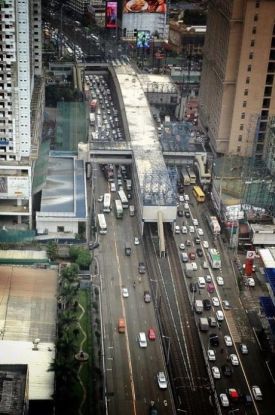 Chaotic private buses single-handedly snarl EDSA traffic.