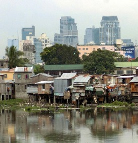 Squatters indiscriminately dump waste onto Manila's waterways.