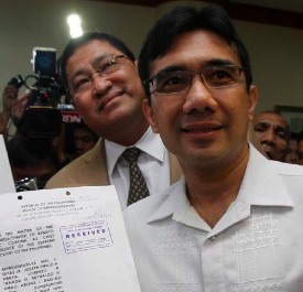 Look who's got your pork: Umali (left) with Niel Tupas in 2012
