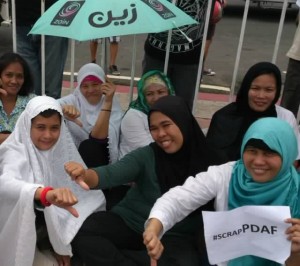 Photo of our Muslim sisters were taken during the #MillionPeopleMarch. Shukran Jazilan! Moving forward beyond ideology, political affiliation and religion!