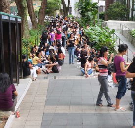 Immigrant workers hangout in Singapore on their day off.