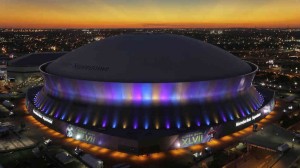 The Superdome in New Orleans, Louisiana. You might remember it during Katrina. Average paid attendance per NFL game 72,901. Looks indoors to me. 