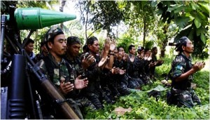 A prayerful army: Moro Islamic Liberation Front fighters observing their prayer obligations