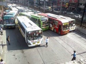 Lack of a modern system: Buses clamber all over one another to pick up passengers because of drivers paid on commission via the 'bounday' system.