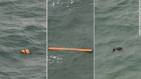 Debris spotted by search crews earlier confirmed to be parts of QZ8501(Source: Photo posted by @CNN on Twitter.)