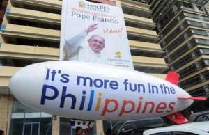 Commercialism and sloganeering has contaminated the papal visit in the Philippines.(Photo courtesy Manny Prieto)