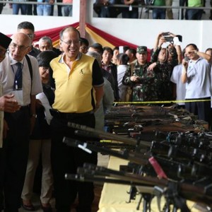 PR stunt: Ceremonial 'decommissioning' of weapons used to terrorise Mindanao for many years. (Courtesy Interaksyon.)