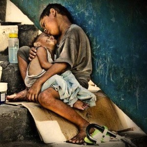 Unmoved by poverty in their own backyard: Filipinos have become desensitized to sights like these.