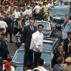 Marcos working the crowd with the late former US President Richard Nixon